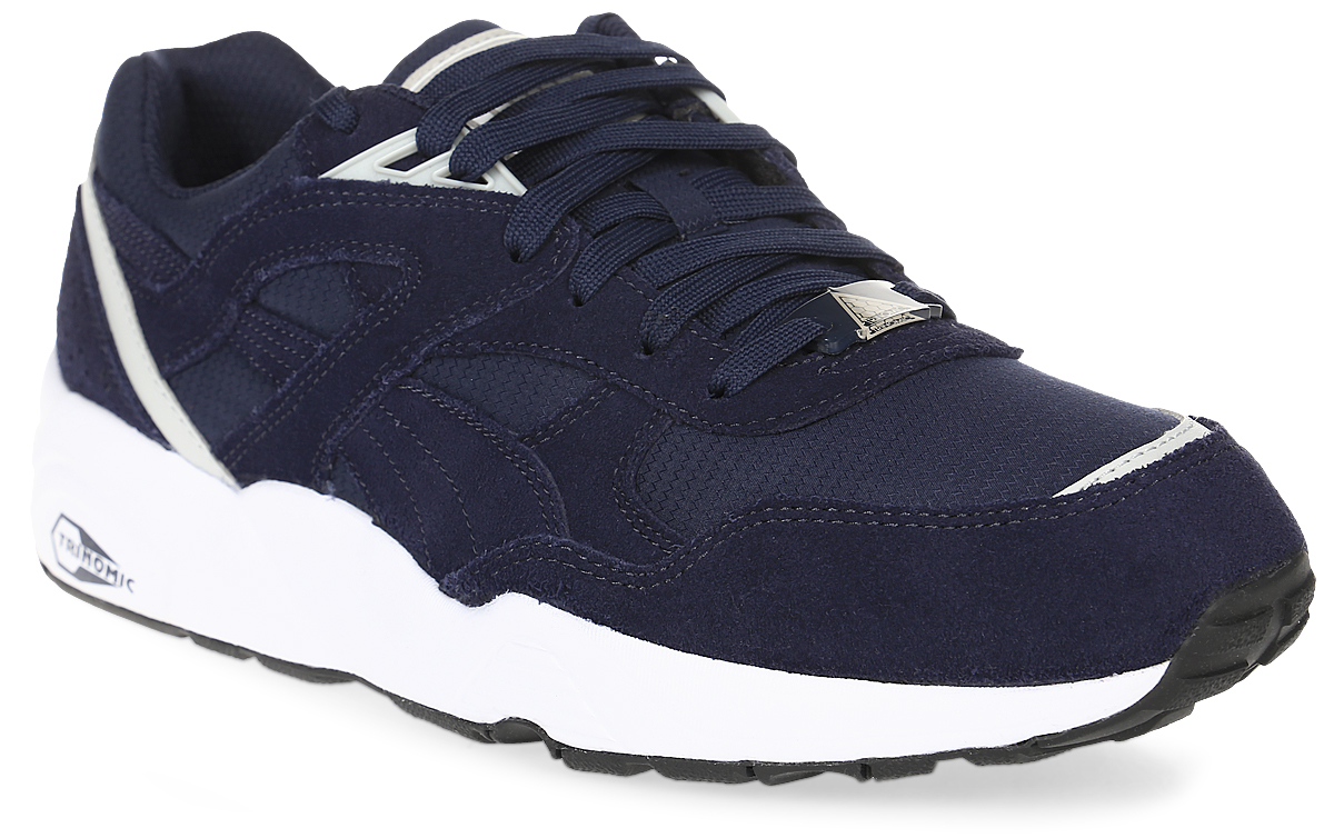 Кроссовки36257002 Кроссовки36257002В этом сезоне Puma вернулась к обновленной модели R698, которая всегда удачно дополняла коллекцию популярной беговой обуви Trinomic. Взяв за основу проверенную подошву Trinomic, специалисты Puma оживили легендарный дизайн чистыми и простыми цветами, выбранными для этого сезона, а также накладкой из материала с мелкой перфорацией в области задника, чтобы новая версия смотрелась еще более привлекательно. Рельефная поверхность подошвы гарантируют отличное сцепление на любых поверхностях. Традиционная шнуровка вместе с мягким язычком обеспечивает надежную фиксацию ноги. В таких кроссовках вашим ногам будет комфортно и уютно.