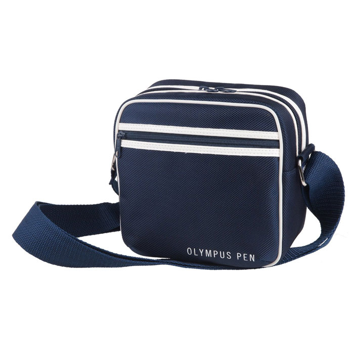 Olympus Pen Street Case MiddleE0414966 Olympus Pen Street Case MiddleE0414966Стильная сумка Olympus Pen Street Case изготовлена для безопасного хранения и транспортировки камер Olympus Pen. Спортивный дизайн в сочетании с высококачественным нейлоном делает сумку идеальной для ежедневной носки. Сумка оснащена регулируемыми перегородками для внутреннего пространства. Также имеется дополнительный карман для хранения небольших аксессуаров, таких как крышка объектива, карты памяти или дополнительный аккумулятор.