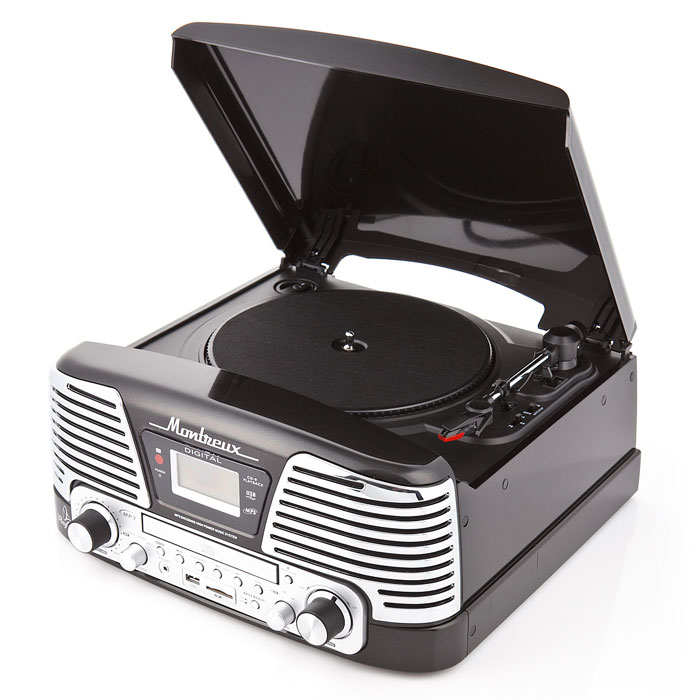 PlayBox Montreux ретро-проигрыватель, Black (PB-106D)PB-106D-BK PlayBox Montreux ретро-проигрыватель, Black (PB-106D)PB-106D-BKPlayBox Montreux (PB-106D) - стильный и компактный проигрыватель виниловых дисков с винтажным дизайном,который напоминает проигрыватели виниловых дисков, популярных в середине прошлого столетия. Данная модель может не только воспроизводить старые пластинки, рассчитанные на скорости вращения 33, 45 и 78 оборотов в минуту, но и переписывать музыку с винила на карты памяти (SD/MMC) и компакт-диски. Помимо всех основных разъемов, проигрыватель оснащен встроенными динамиками.