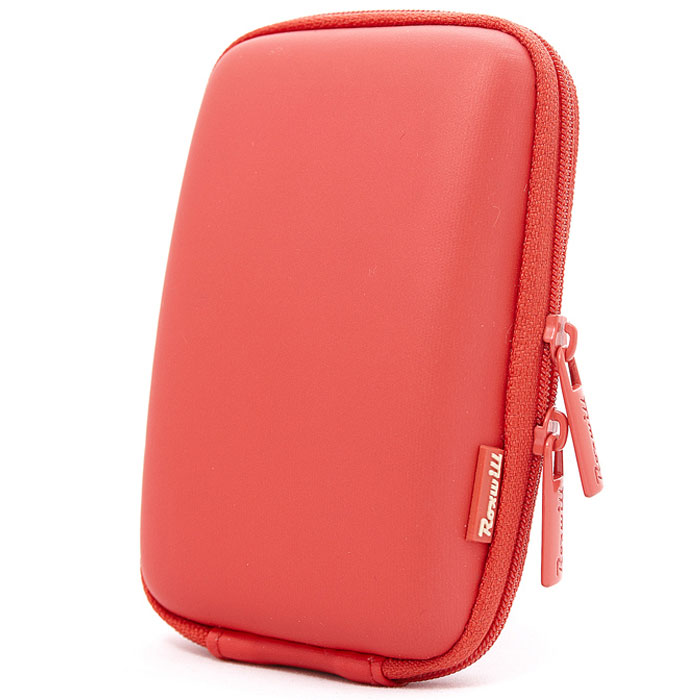 Roxwill C40, Red чехол для фото- и видеокамерC40 red Roxwill C40, Red чехол для фото- и видеокамерC40 redRoxwill C40 - надежный чехол для компактных фотокамер. Он гарантированно защитит вашу камеру от случайных ударов и царапин, а также от пыли и влаги. Изделие изготовлено из EVA (вспененная резина). Данный материал не подлежит воздействию агрессивных веществ и предохраняет фотоаппарат при падении. Для переноски предусмотрен регулируемый шейный ремешок и возможность крепления на поясном ремне.