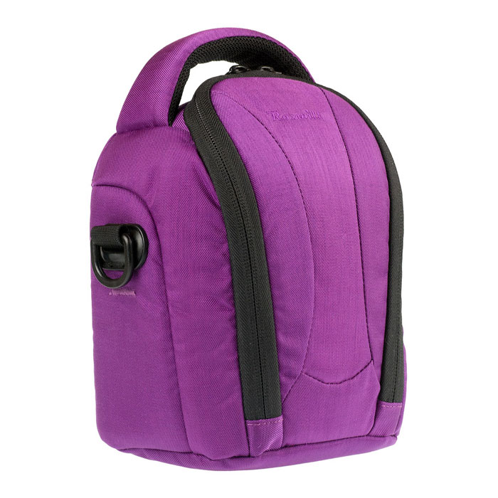 Roxwill NEO-20, Purple чехол для фото- и видеокамерNEO-20 purple Roxwill NEO-20, Purple чехол для фото- и видеокамерNEO-20 purpleСтильная сумка Roxwill NEO-20 с цветными вставками для зеркальной фотокамеры с установленным объективом. Надежно защитит вашу камеру от случайных ударов и царапин, а также от пыли и влаги. Верхний откидной клапан закрывается на двойную застежку «молния» и обеспечивает быстрый доступ к фотокамере. Имеется два внутренних кармана для карт памяти. Для переноски предусмотрены регулируемый наплечный ремень и удобная ручка.