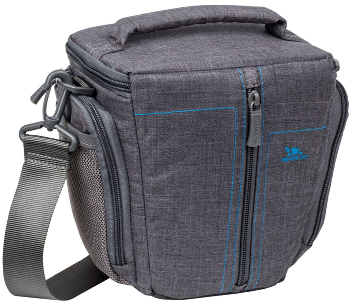 Riva 7501 SLR Canvas Case, Grey сумка для зеркальной фотокамеры6580 Riva 7501 SLR Canvas Case, Grey сумка для зеркальной фотокамеры6580Стильная сумка с контрастной синей подкладкой и чехлом от дождя Riva 7501 SLR Canvas Case для зеркальной фотокамеры с установленным объективом из высококачественной, водоотталкивающей ткани имеет верхний откидной клапан, который закрывается на молнию и обеспечивает быстрый доступ к фотокамере. Передний внешний карман на молнии служит для хранения аксессуаров, как и два внешних боковых кармана на молнии и дополнительный карман на задней стенке. Для переноски предусмотрены регулируемый наплечный ремень с мягкой накладкой и удобная ручка.