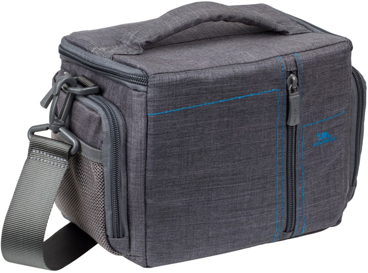 Riva 7502 SLR Canvas Case, Grey сумка для зеркальной фотокамеры6581 Riva 7502 SLR Canvas Case, Grey сумка для зеркальной фотокамеры6581Стильная сумка с контрастной синей подкладкой и чехлом от дождя Riva 7502 SLR Canvas Case для зеркальной фотокамеры с установленным объективом из высококачественной водоотталкивающей ткани оснащена верхним откидным клапаном, который закрывается на молнию и обеспечивает быстрый доступ к фотокамере. Дополнительно возможно разместить 1 объектив и вспышку с помощью системы внутренних передвижных перегородок. Передний внешний карман на молнии служит для хранения аксессуаров, как и два внешних боковых кармана на молнии и дополнительный карман на задней стенке. Для переноски предусмотрены регулируемый наплечный ремень с мягкой накладкой и удобная ручка.