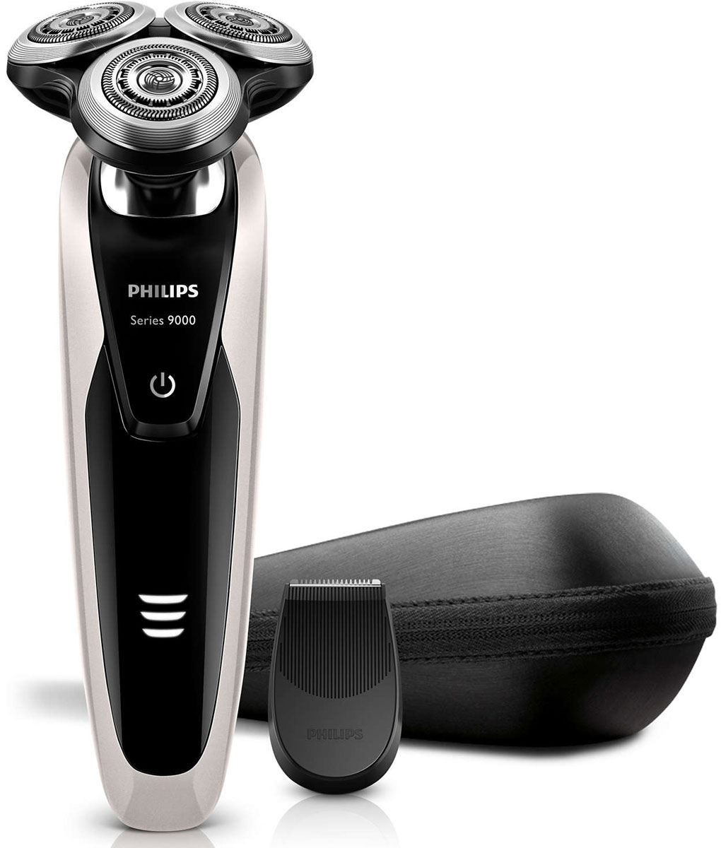 Philips S9041/12 электробритваS9041/12 Philips S9041/12 электробритваS9041/12Philips S 9041/12 — наиболее совершенная бритва Philips на сегодняшний день. Уникальная технология повторения контуров гарантирует идеальное скольжение, а система лезвий V-Track обеспечивает более удобный захват волосков и максимально чистое бритье. Запатентованные лезвия V-Track Precision аккуратно захватывают и направляют волоски любой длины, а также волоски, прилегающие к коже. Обеспечивает на 30 % более гладкое и быстрое бритье, чтобы ваша кожа всегда выглядела безупречно. Новые гибкие головки вращаются в 8 направлениях, максимально точно повторяя контуры лица и требуя меньше усилий при каждом движении. Головки, двигающиеся независимо от бритвенного элемента, захватывают на 20 % больше волосков и обеспечивают более чистое бритье при меньшем количестве движений. Встроенная система двойных лезвий электрической бритвы Philips S 9041/12 приподнимает волоски, сбривая их максимально близко к поверхности кожи, что обеспечивает более чистое бритье. Уплотнение...