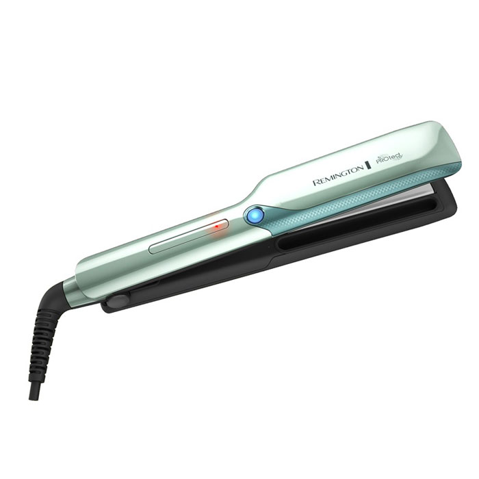 Remington S8700 выпрямитель для волосS8700 Remington S8700 выпрямитель для волосS8700Выпрямитель Remington S8700 разработан с целью снижения повреждений волос на 68% по сравнению со стандартным выпрямителем. Данная модель гарантирует профессиональный результат и меньше повреждений волос от воздействия тепла благодаря инновационной технологии увлажнения волос во время стайлинга - HydraCare. Суть технологии HydraCare состоит в увлажнении волос с помощью холодного пара непосредственно перед выпрямлением, что позволяет совершать стайлинг с использованием меньшей температуры и с гарантированным результатом, как при использовании стандартного выпрямителя. Оптимальная температура для стайлинга с использованием технологии холодного пара HydraCare составляет 170° C. Холодный пар увлажняет волосы и позволяет создавать профессиональную укладку, обеспечивая защиту от тепла. Пять настроек температуры до 230°C и встроенный цифровой дисплей позволяют с легкостью выбрать нужный режим. Усовершенствованные керамические пластины с содержанием...