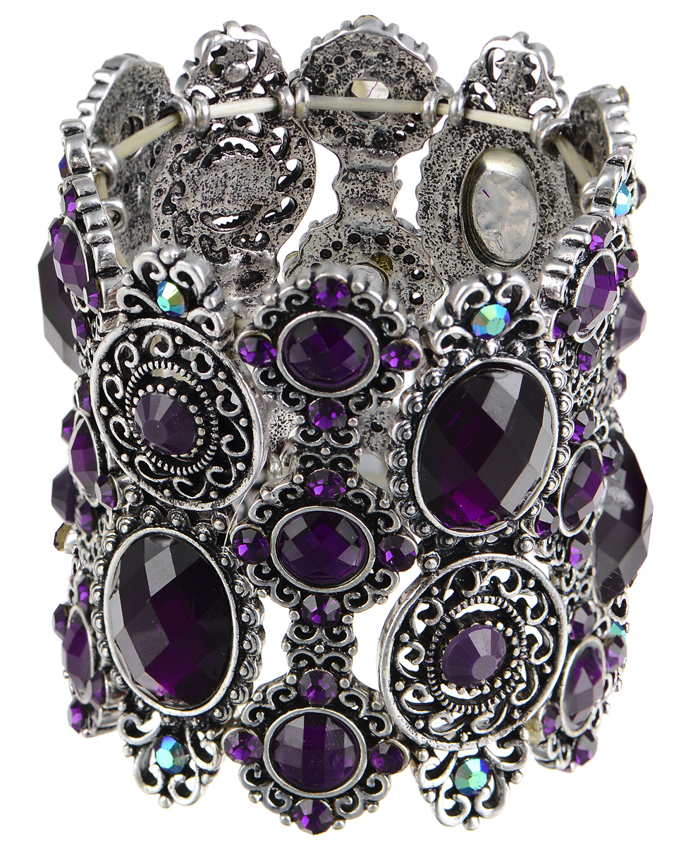 Браслет Taya, цвет: серебряный, фиолетовый. T-B-7409T-B-7409-BRAC-PURPLE Браслет Taya, цвет: серебряный, фиолетовый. T-B-7409T-B-7409-BRAC-PURPLEСтильный браслет Taya выполнен из бижутерийного сплава. Элементы оригинальной формы оформлены вставками из сияющих стразов граненых камней. Благодаря эластичной основе и подвижным элементам изделие идеально разместиться на запястье. Такой браслет позволит вам с легкостью воплотить самую смелую фантазию и создать собственный, неповторимый образ.