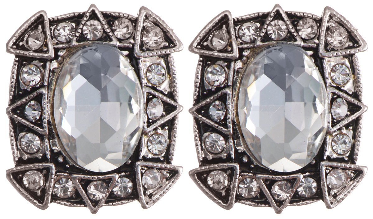 Серьги Taya, цвет: серебристый. T-B-9770T-B-9770-EARR-SILVER Серьги Taya, цвет: серебристый. T-B-9770T-B-9770-EARR-SILVERЭлегантные серьги современного дизайна Taya изготовлены из металлического сплава. Серьги оригинальной формы дополнены стразами, центральная часть сережек украшена крупным декоративным камнем. В качестве основания изделия используется замок-омега, который надежно зафиксирует сережку. Стильные серьги помогут дополнить любой образ и привнести в него завершающий яркий штрих.