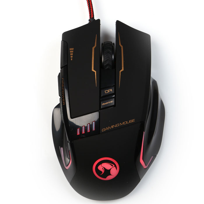 Marvo G909 игровая мышьG909 BK Marvo G909 игровая мышьG909 BKИгровая проводная оптическая мышь Marvo G909. Манипулятор удобно лежит в руке. Качественный оптический сенсор Sunplus 169IC имеет три настройки разрешения 800/1600/3200 dpi с возможностью изменения на лету. Девайс оснащен 8 кнопками способными выдержать до 3 миллионов нажатий и подсветкой.