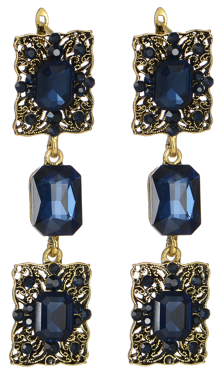 Серьги Taya, цвет: золотистый, темно-синий. T-B-11321T-B-11321-EARR-GL.D.BLUE Серьги Taya, цвет: золотистый, темно-синий. T-B-11321T-B-11321-EARR-GL.D.BLUEИзящные серьги современного дизайна Taya изготовлены из металлического сплава, модель не оставит равнодушной ни одну любительницу изысканных и необычных украшений. Серьги выполнены в виде оригинальных подвесок инкрустированных стразами и дополненные крупными камнями. Серьги застегиваются на английский замок. Такие серьги позволят вам с легкостью воплотить самую смелую фантазию и создать собственный, неповторимый образ.