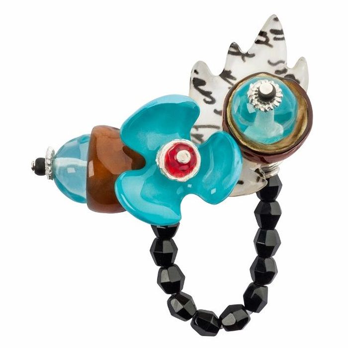Кольцо Lalo Treasures G&G, цвет: светло-бирюзовый, коричневый. R6984mR6984m Кольцо Lalo Treasures G&G, цвет: светло-бирюзовый, коричневый. R6984mR6984mИзысканное кольцо оригинального дизайна Lalo Treasures изготовлено из ювелирной смолы ярких цветов. Изделие выполнено в виде утонченного цветка. Скругленные углы элемента идеально подходят для нежных женских пальцев - изящество и сама элегантность. Очень винтажно смотрится на руке. Кольцо Lalo подчеркнет вашу утонченность и изысканный вкус. Изделие регулируется по размеру.