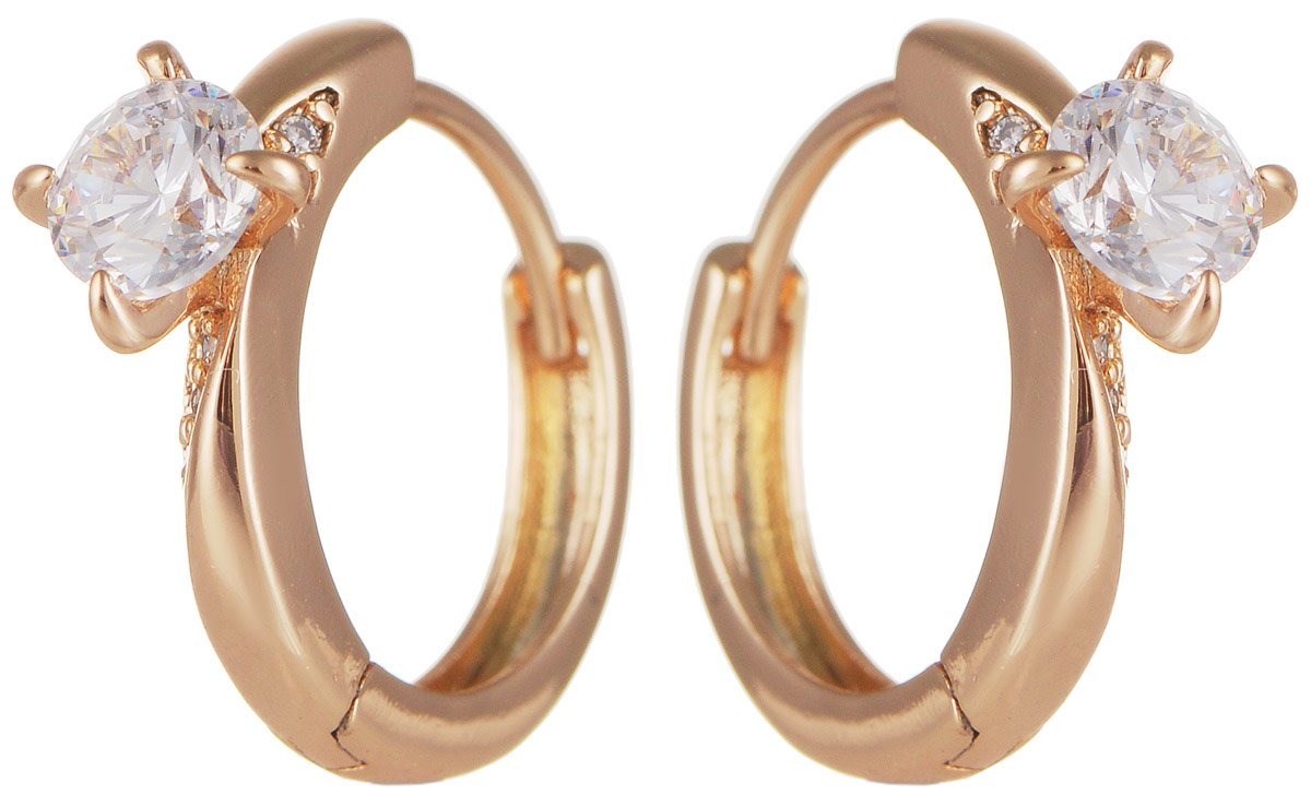 Серьги Taya, цвет: золотистый. T-B-11706T-B-11706-EARR-GOLD Серьги Taya, цвет: золотистый. T-B-11706T-B-11706-EARR-GOLDМодные позолоченные серьги Taya изготовлены из бижутерного сплава и оформлены большим цирконом. Застегивается изделие с помощью замка-конго. Оригинальные серьги внесут изюминку, как в повседневный, так и в выходной образ и позволят выделиться среди окружающих.