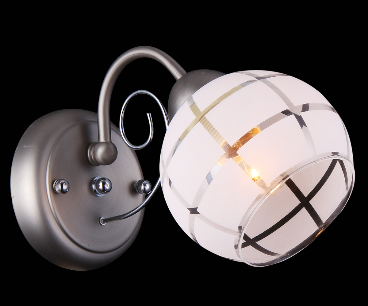Бра Natali Kovaltseva, 1 х E27, 60W. 11446/1W11446/1W NICKEL, CHROME Бра Natali Kovaltseva, 1 х E27, 60W. 11446/1W11446/1W NICKEL, CHROMEВ коллекциях NATALI KOVALTSEVA представлены разные стили – от классики до хайтека. Дизайн и технологическая составляющая продукции разрабатывается в R&D центре компании, который находится в г. Дюссельдорф, Германия. При производстве нашей продукции используются высококачественные и эксклюзивные материалы: хрусталь ASFOR, муранское стекло, перламутр, 24-каратное золото, бронза. Производство светильников соответствует стандарту системы менеджмента качества ISO 9001-2000. На всю продукцию ТМ Natali Kovaltseva распространяется гарантия.