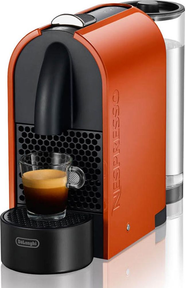 DeLonghi EN 110.O Nespresso кофемашина0132191089 DeLonghi EN 110.O Nespresso кофемашина0132191089DeLonghi EN 110.O - полностью автоматическая кофемашина с лаконичным и простым дизайном. Вызывающий корпус оранжевого цвета не оставит никого равнодушным. Автоматическое заваривание Вам нужно только поместить капсулу в машину и закрыть крышку чтобы активировать процесс приготовления любимого эспрессо. Также имеется возможность выбрать удобное положение емкости для воды и 3 различных позиции подставки для чашек на магните. Части корпуса, не имеющие контакта с кофе, изготовлены из переработанного пластика. Автоматическое и программируемое количество воды на порцию Энергосберегающий режим Настройки: 25 мл для ристретто, 40 мл для эспрессо и 110 мл для лунго Автоматический выброс капсул