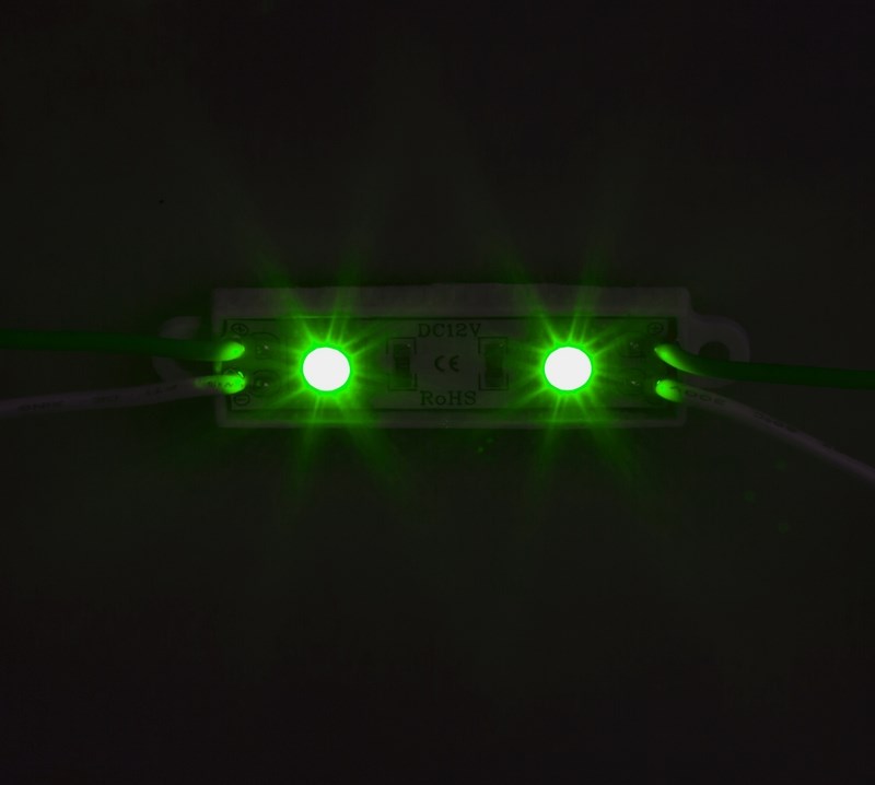 Модуль светодиодный, IP67 влагозащищенный, 2 SMD 5050 LED, ЗЕЛЕНЫЙ141-404 Модуль светодиодный, IP67 влагозащищенный, 2 SMD 5050 LED, ЗЕЛЕНЫЙ141-404Светодиодные модули. При помощи светодиодных модулей изготавливаются объемные буквы, различные световые короба, декоративная подсветка интерьера, фасадное освещение. Наметилась тенденция к замене светодиодными модулями неона во внутренней подсветке больших букв. При их использовании отпадает надобность в установке каждого светодиода по отдельности, поэтому время на монтаж существенно сокращается. Это стало причиной отказа от применения локальных светодиодов в пользу модулей. В нашем каталоге представлены все возможные варианты светодиодных модулей, включающие от 2-х до 6 диодов всех основных цветов. Светодиодный модуль может служить свыше 50 000 часов, а энергии он потребляет почти в 10 раз меньше, чем лампы накаливания. Применение таких приборов ведет к заметной экономии электроэнергии.