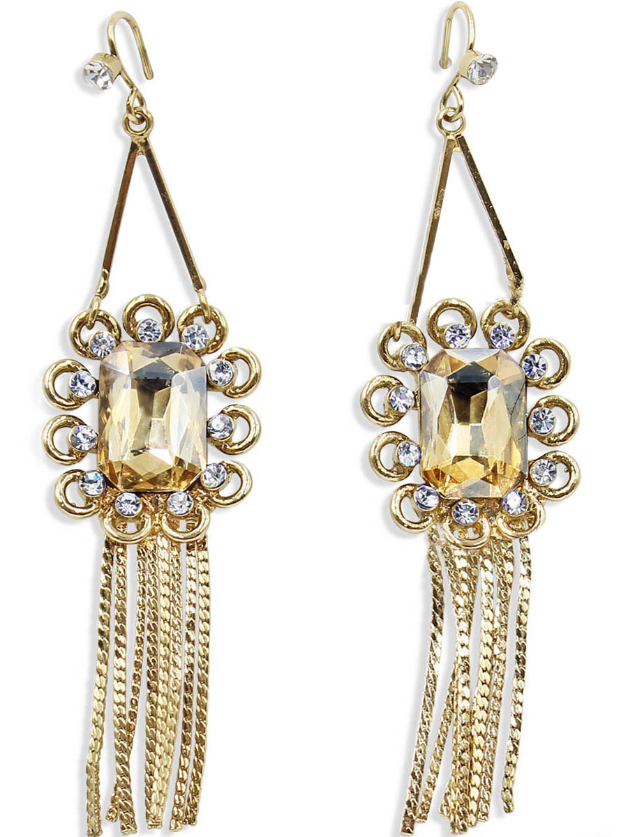 Серьги Taya, цвет: золотистый. T-B-12456T-B-12456-EARR-GOLD Серьги Taya, цвет: золотистый. T-B-12456T-B-12456-EARR-GOLDСерьги с застежкой-петлей и силиконовой заглушкой. Песочно-желтый кристалл в витой рамке со вставленными по периметру прозрачными стразами. Цепи-подвески плоские и словно развиваются на ветру.