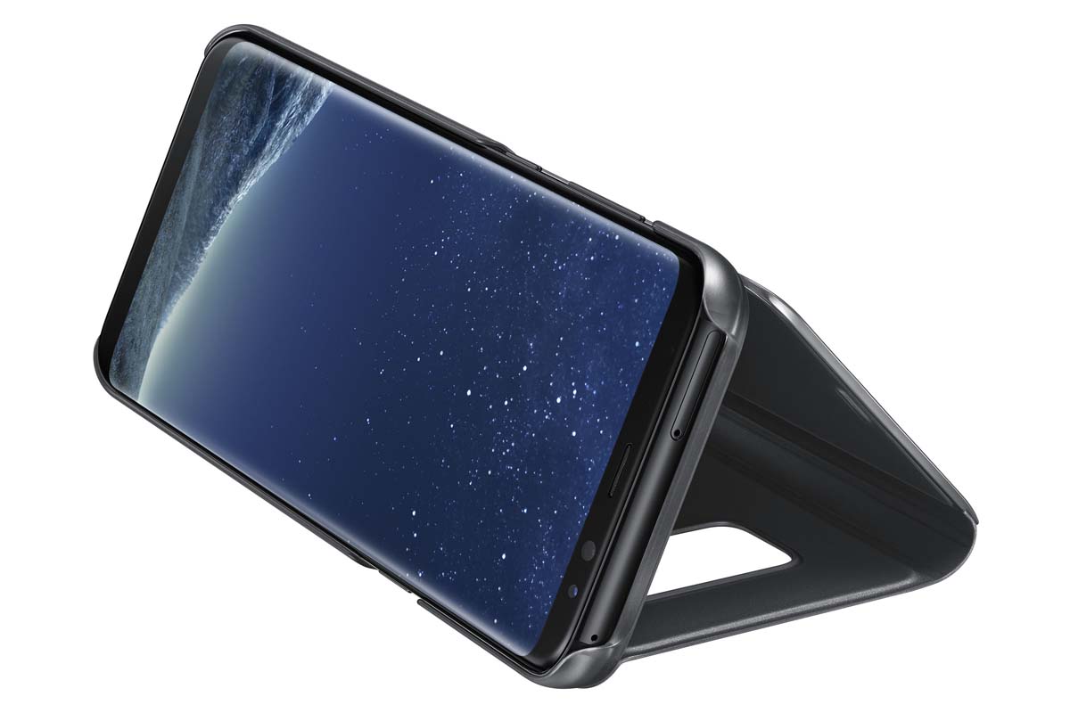 Samsung Clear View Standing чехол для Galaxy S8+, BlackEF-ZG955CBEGRU Samsung Clear View Standing чехол для Galaxy S8+, BlackEF-ZG955CBEGRUТонкий полупрозрачный чехол подчеркивает стиль и изящество смартфона. Аксессуар обеспечивает быстрый доступ к функциям — следите за информацией на экране, не открывая чехла. Сквозь прозрачную верхнюю крышку видны время, пропущенные вызовы, индикатор заряда. Флип-кейс отзывчиво реагирует на прикосновения — отвечайте на звонки одним легким движением. Чехол устойчив к появлению отпечатков пальцев — ваш смартфон всегда в аккуратном состоянии. Особое покрытие чехла защищает смартфон от повреждений, продлевая срок его службы.