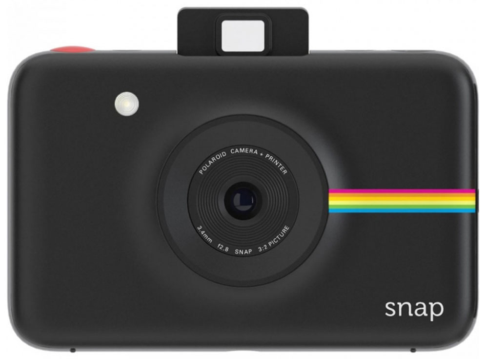 Polaroid Snap, Black фотокамера мгновенной печатиPOLSP01BE Polaroid Snap, Black фотокамера мгновенной печатиPOLSP01BEPolaroid Snap — компактная камера, способная сразу распечатать полученный снимок. В устройстве используется технология ZINK, позволяющая получать отпечатки без использования чернил. Данная разработка уже успела зарекомендовать себя в других камерах Polaroid. Снимки разрешением 10 Мп мгновенно преобразуются в отпечатки размером 2х3 дюйма. Хранить фотографии можно на карте памяти microSD объёмом до 32 ГБ. Дополняют картину несколько сценариев съёмки, возможность выставить таймер, а также режим, в котором камера делает шесть снимков за 10 секунд. Формат отпечатков: 50 мм х 75 мм