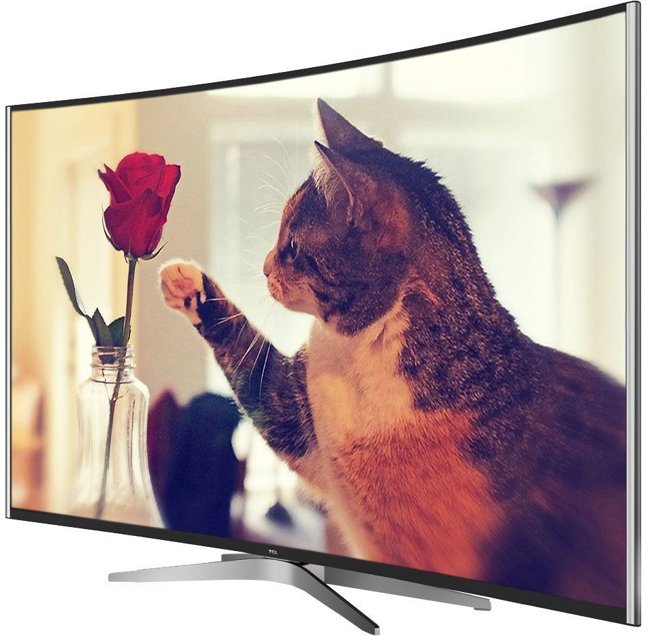 TCL L55C1CUS, Black телевизорUE55MU6100UXRU TCL L55C1CUS, Black телевизорUE55MU6100UXRUТелевизор TCL L55C1CUS представлен в изогнутом корпусе. Легко впишется в любой интерьер, а специальнаявозможность крепления телевизора на стену позволит разместить устройство с максимальным удобством.Может похвастаться современным дизайном корпуса и тонкими рамками экрана.Устройство поддерживает современный формат HDR (High Dynamic Range), предназначенный для повышенияпрорисовки полутонов на экране телевизора и позволяющий максимально приблизить реалистичностьтелевизионной картинки к оригиналу. Телевизор с HDR создает более привлекательное для глазаизображение, расширяя диапазон передачи цветовых оттенков и позволяя зрителю различать до миллиардатончайших цветовых тонов. Широкий угол обзора дает также возможность получать отличное качествокартинки без искажения.LED телевизор L55C1CUS от TCL позволяет открыть для себя новое качество изображения вформате 4К. Невероятная четкость стала возможной благодаря мощному шестиядерному графическомупроцессору. Каждый кадр подвергаются тщательному анализу, после чего выполняется улучшение качестваотображения текстур, контрастности, цветопередачи и контуров. Детализация изображения прииспользовании подобных технологий в 4 раза выше, чем у телевизоров Full HD.TCL L55C1CUS поддерживает функцию Motion Estimation and Motion Compensation. Это возможностьпреобразования частоты кадров видео, позволяющая видеть действие на экране более плавным, чётким иреалистичным. Технология позволяет видеть самые мелкие детали изображения, даже в том случае, когдаобъекты на экране движутся молниеносно.Оптимизация звука и изображения дает возможность в полной мере наслаждаться просмотром динамичныхфильмов или спортивных соревнований, обеспечивая полный эффект присутствия.Smart-телевизор откроет для своих обладателей новый мир увлекательных и полезных функций, которыеразнообразят жизнь пользователей и превратят устройство в настоящего друга и персонального помощника.Телевизор оснащен операционной системой Android и возможностью беспроводного доступа в интернет, чтопозволит загружать любимые фильмы и приложения прямо из сети. Кроме того, устройство уже имеет рядпредустановленных приложений и умных функций. Например, таких как телетекст, таймер сна, родительскийконтроль.Звук Dolby Digital сделает обладателя ТВ участником событий вместе с киногероями. Стереофонический,мощный, обогащенный басами звук никого не оставит равнодушным.Тюнер DVB-T2 позволяет без дополнительного оборудования смотреть телеканалы в цифровом качестве безпомех.