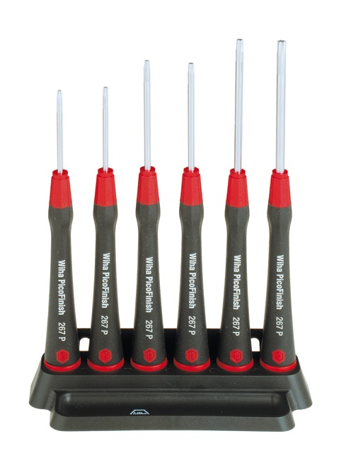 Набор отверток PicoFinish TORX 267PF K6 6 ед Wiha 0376503765 Набор отверток PicoFinish TORX 267PF K6 6 ед Wiha 0376503765Удобные прецизионные отвертки: - Эргономичная многокомпонентная рукоятка с крутящимся колпачком под палец и зоной быстрого кручения для мгновенного закручивания. - Жало из стали, легированной хромом, ванадием и молибденом. - Наконечник Wiha ChromTop гарантирует максимальное соответствие размерности. - Идеальный инструмент для всех точных и филигранных работ с электроникой и точной механикой. В комплекте поставляется специальная подставка. Материал: ударопрочная экологически чистая пластмасса, термопластичный эластомер, хром-ванадий молибденовая сталь. Размер: T7 x 40 мм; T8 x 40 мм; T9 x 50 мм; T10 x 50 мм; T15 x 60 мм; T20 x 60 мм.