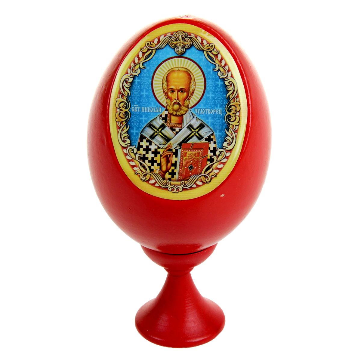 Яйцо декоративное Sima-land Николай Чудотворец, на подставке, высота 11 см888760 Яйцо декоративное Sima-land Николай Чудотворец, на подставке, высота 11 см888760Декоративное яйцо Sima-land Николай Чудотворец изготовлено из дерева. Яйцо оформлено яркой наклейкой с изображением Николая Чудотворца, покрытой смоляным слоем. Изделие располагается на деревянной подставке. Декоративное яйцо Sima-land Николай Чудотворец принесет в ваш дом ощущение торжества, душевного уюта и станет идеальным подарком на Пасху. Диаметр яйца: 5,5 см. Высота яйца: 8 см. Размер подставки: 3 см х 3 см х 3,5 см.