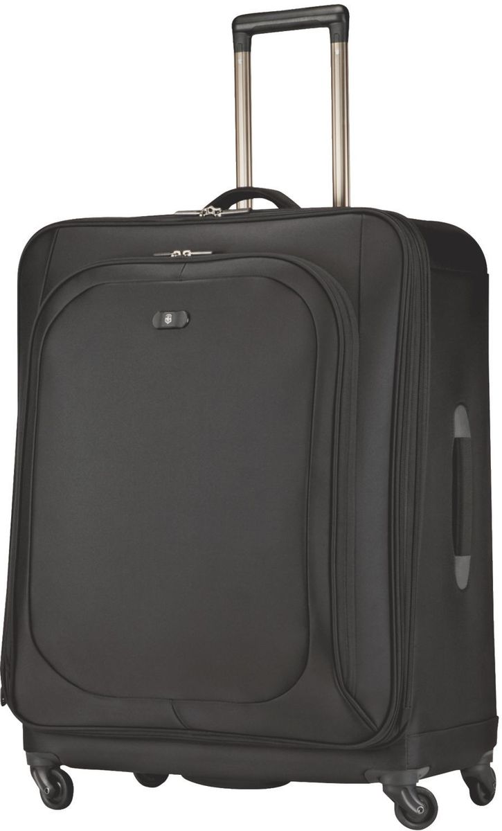 Чемодан Victorinox Hybri-Lite, цвет: черный. 3131730131317301 Чемодан Victorinox Hybri-Lite, цвет: черный. 3131730131317301Оригинальный швейцарский армейский нож «Swiss Army» был создан в 1897 году в небольшой деревушке Ибах в Швейцарии.С тех пор продукция,выпускаемая под маркой «Victorinox» с ее узнаваемым логотипом в виде креста на щите,по праву считается эталоном отличного качества,высокой функциональности,инновационных технологий и культового дизайна.Наша преданность принципам в течение последних 130 лет позволила нам создавать продукты,которые являются выдающимися не только по дизайну и качеству,но которые также являются надежными спутниками в больших и маленьких жизненных приключениях. Сегодня мы с гордостью представляем линейку сумок,чемоданов и дорожных аксессуаров,которые наилучшим образом воплощают в себе данные принципы,а также сочетают в себе черты нашего лучшего классического стиля. Предоставляя инновационные решения для глобального путешественника,коллекция Hybri-Lite совмещает в себе преимущества мягких чемоданов с технологией,которая используется при разработке твердых...