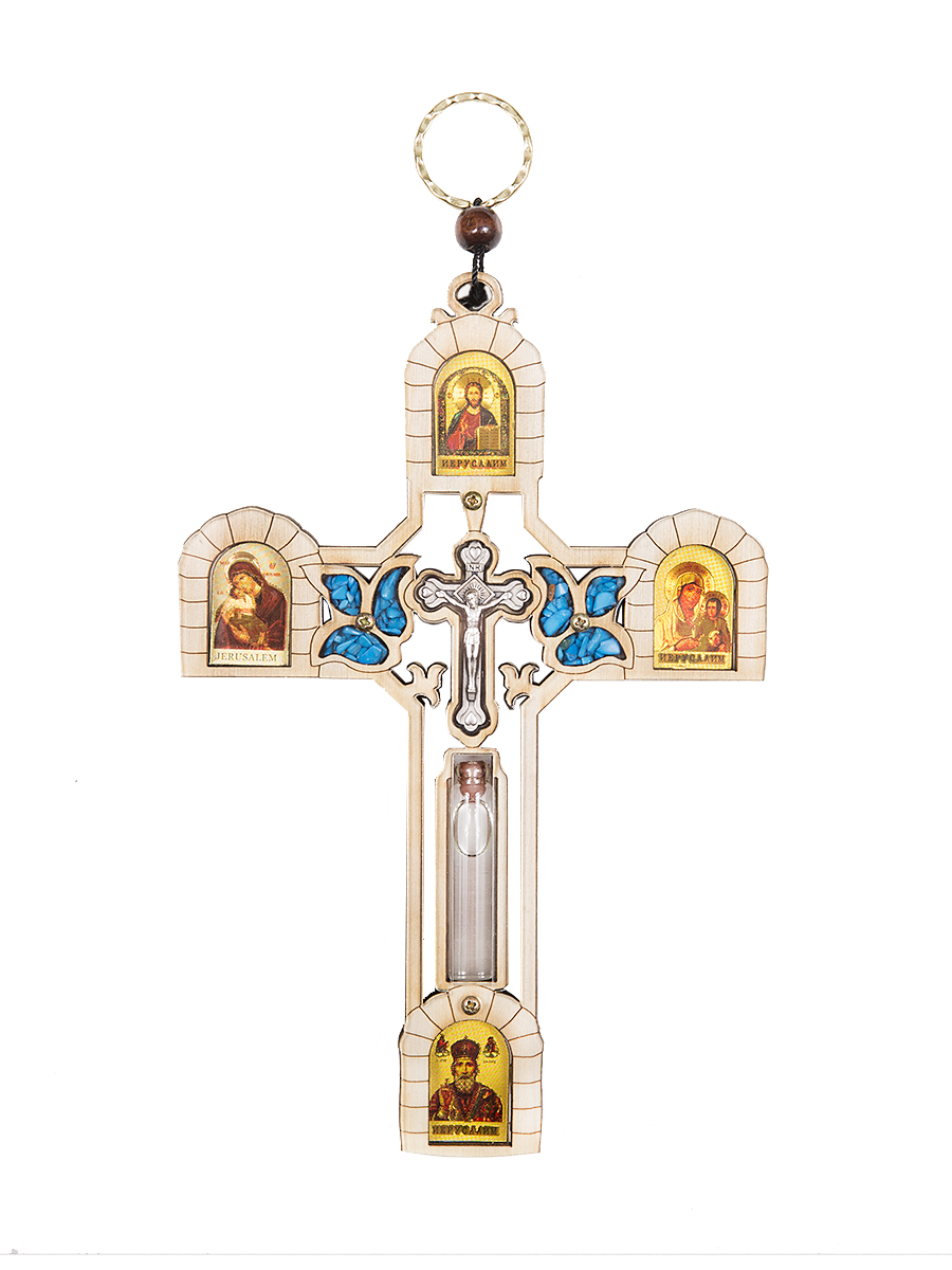 Икона Holy Land Collections Крест со Святой водой из Иордана, 123 x 184 мм300196 Икона Holy Land Collections Крест со Святой водой из Иордана, 123 x 184 мм300196Распятие с иконами и Святой водой из Иордана, украшено полудрагоценными камнями и является продуктом ручной работы из Святой Земли. Распятием называют изображение Господа Иисуса Христа, распятого на Крест или сам Крест с изображением Распятия. Изображение креста, на котором был распят Иисус Христос, является главным и обязательным символом христианской религии. Это изображение обязательно присутствует в святых местах, а также у верующих дома или в качестве нательного украшения. Уникальной особенностью этого распятия является емкость со Святой водой из реки Иордана. Распятие можно использовать как настенный крест. Размеры: 12.3 х 18.4 см