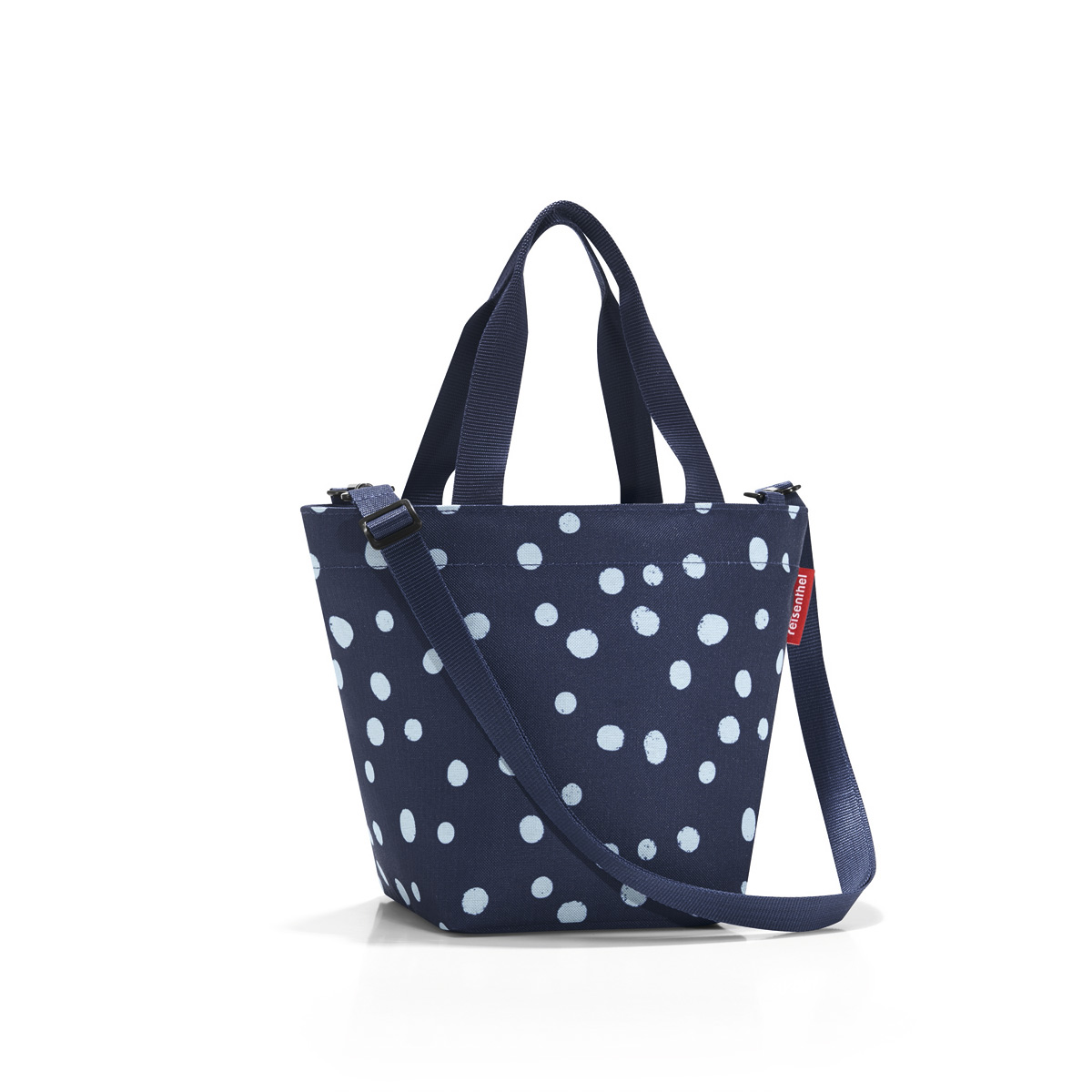 Сумка-шоппер женская Reisenthel Shopper XS spots navy, цвет: синий. ZR4044ZR4044 Сумка-шоппер женская Reisenthel Shopper XS spots navy, цвет: синий. ZR4044ZR4044Симпатичная сумка для повседневного использования: широкие удобные лямки для переноски в руках и удобный плечевой ремешок с регулируемой длиной, который можно отстегнуть.Объем 4 литра позволяет вместить все необходимые мелочи. Застегивается на молнию. Внутри - кармашек на молнии.