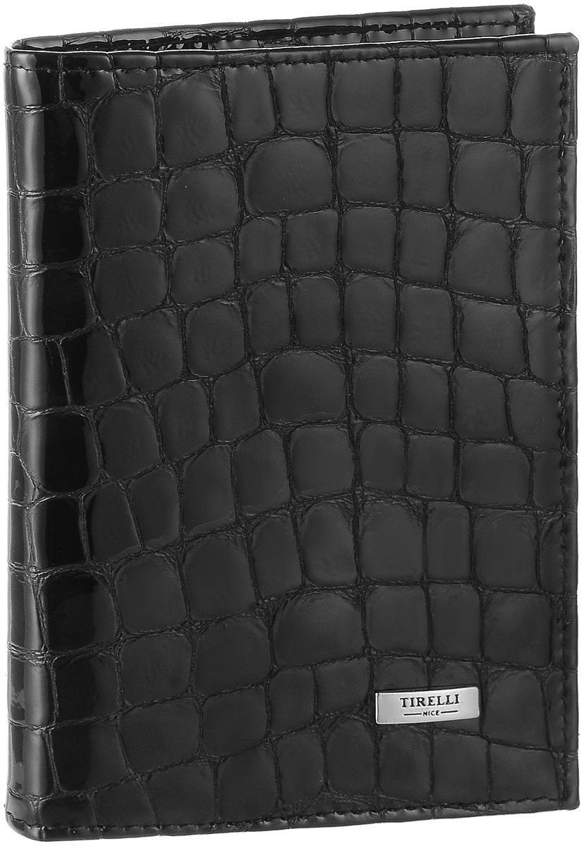 Обложка для автодокументов женская Tirelli Санта Моника, цвет: черный. 15-305-1415-305-14 Обложка для автодокументов женская Tirelli Санта Моника, цвет: черный. 15-305-1415-305-14Женская обложка для автодокументов Tirelli Санта Моника, выполненная из натуральной лакированной кожи, оформлена тиснением под рептилию. Изделие раскладывается пополам. Обложка содержит съемный блок из шести прозрачных файлов из мягкого пластика, четыре боковых кармана и четыре прорезных кармана для пластиковых карт. Изделие упаковано в фирменную коробку. Модная обложка для автодокументов поможет сохранить их внешний вид и защитить от повреждений.