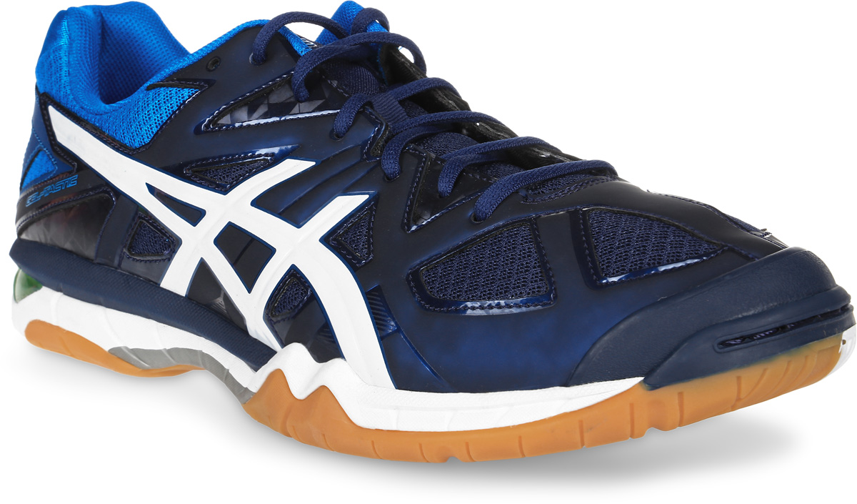 Кроссовки для волейбола мужские Asics Gel-Tactic, цвет: темно-синий, синий. B504N-5801. Размер 10H (43)B504N-5801 Кроссовки для волейбола мужские Asics Gel-Tactic, цвет: темно-синий, синий. B504N-5801. Размер 10H (43)B504N-5801Кроссовки обеспечивают максимальный комфорт во время многочасовых перемещений по площадке, а также придают необходимое ускорение для стремительного рывка. Износоустойчивая синтетическая кожа продлевает срок службы кроссовок. Непревзойденный комфорт модели обеспечивают технология Asics Gel (специальный вид силикона) в носке и пятке, которая снижает нагрузку на пятку, колени и позвоночник спортсмена, и волшебная подошва - вентилируемая средняя подошва, которая минимизирует вес обуви и максимизирует циркуляцию воздуха. Смелый дизайн кроссовок сделает спортсмена заметным на всем протяжении игры.