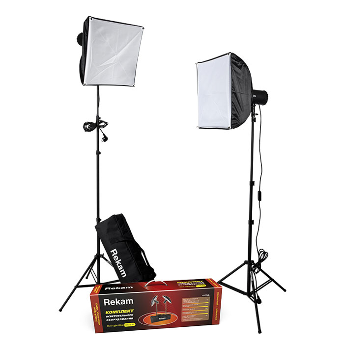 Rekam Mini-Light Ultra M-250 SB Kit комплект ламп-вспышек60-PC250J/K2SB Rekam Mini-Light Ultra M-250 SB Kit комплект ламп-вспышек60-PC250J/K2SBКомплект Rekam Mini-Light Ultra M-250 SB Kit продолжает развитие серии комплектов осветительного оборудования мини-формата. Данный комплект представляет собой отличное решение для небольшой фотостудии, и может использоваться для любого вида студийной съемки – портретной, групповой, предметной.В основе комплекта два компактных импульсных осветителя-моноблока с плавной регулировкой мощности до 250 Дж. Моноблок имеет встроенные 2-лепестковые шторки для регулировки количества и направления света. При транспортировке и хранении шторки служат защитой лампового узла. В комплект входят два оригинальных софт-бокса 40х40 см, созданные специально для осветителей комплекта. Синхронизация с зеркальными и «беззеркальными» камерами осуществляется при помощи включенного в поставку синхрокабеля, или по «световому потоку». Есть возможность синхронизировать моноблоки с любительскими фотокамерами по 2 и 3 импульсам.