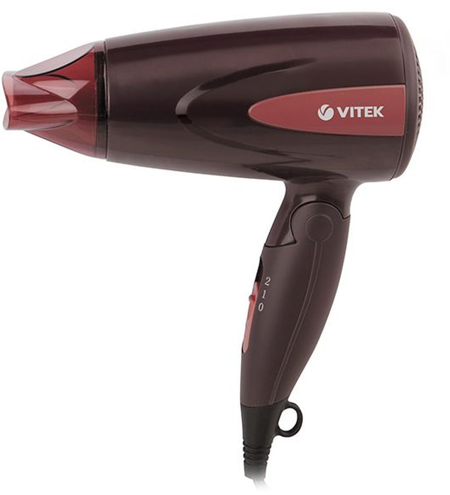 Vitek VT-2261(BN) фенVT-2261(BN Vitek VT-2261(BN) фенVT-2261(BNЛегко уложить волосы при этом сохранив их естественное здоровье вам позволит мощный, стильный и удобный фен Vitek VT-2261(BN). Данное устройство гармонично сочетает в себе приятный дизайн и оптимальный набор функций, которые позволят быстро высушить волосы и создать стильную укладку. Фен оснащен двумя скоростями работы, поэтому вы всегда можете изменить как температурный режим, так и интенсивность подачи горячего или холодного воздуха. Концентратор позволит придать волосам объем у корней, а режим подачи холодного воздуха - зафиксировать получившуюся прическу. Такой фен вы всегда можете взять с собой в путешествие, удобно уложив в чемодане благодаря складной ручке. Петелька для подвешивания позволит удобно повесить фен в ванной, экономя пространство.
