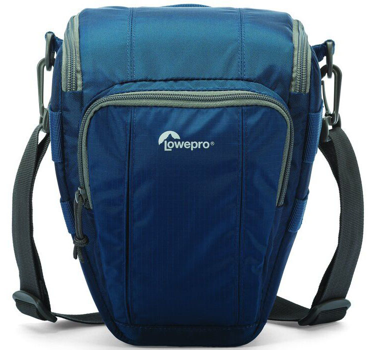 Lowepro Toploader Zoom 50 AW II, Blue сумка для фотокамерыLP36703-0RU Lowepro Toploader Zoom 50 AW II, Blue сумка для фотокамерыLP36703-0RUВторое поколение сумок серии Toploader Zoom AW II предоставляют надежную защиту в течения дня на прогулке, в путешествие или при спортивной съемке. Компактные, оснащенные возможностью быстрого доступа к камере сумки, которые можно носить тремя способами (на плече, поясе или с помощью специальной разгрузочной системы Topload Chest Harness). Бегунки застежек-молний, которые легко открываются и закрываются при низких температурах, имеют специальные D-образные кольца: их просто нащупать, за них легко ухватиться. На светло-серой ткани отделки основного отсека сумок быстрее можно разглядеть нужную вещь. Все сумки серии оснащены встроенным всепогодным защитным чехлом All Weather AW Cover и вместительным фронтальным карманом на молнии для разных полезных мелочей, кошелька или документов