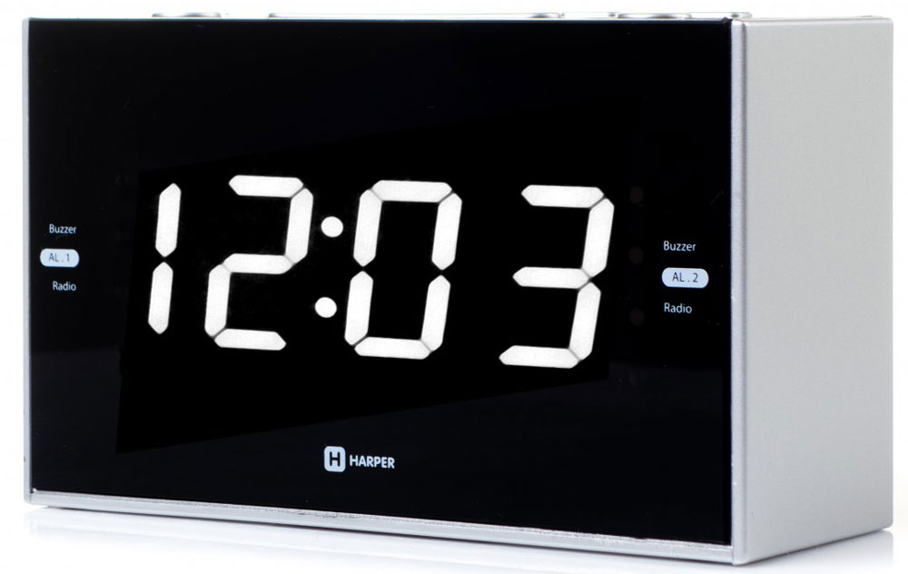 Harper HCLK-2041 радиобудильникH00001164 Harper HCLK-2041 радиобудильникH00001164Harper HCLK-2041 – это удобный прибор, в котором совмещены функции часов, будильника и радиоприемника. При этом функции можно совместить между собой – так, вы можете установить в качестве мелодии на будильник эфир любимой радиостанции. Устройство запоминает до 20 радиоканалов - 10 в FM-диапазоне и 10 в AM-диапазоне. Найти их вы можете как в автоматическом, так и в ручном режиме (последняя функция пригодится в зоне не очень уверенного радиосигнала). Выбранная радиочастота будет отражаться на дисплее. Часы-будильник оснащены ярким светодиодным дисплеем, на котором время видно даже в полной темноте. При этом энергии прибор расходует совсем немного. Harper HCLK-2041 работают от электросети. Батарейки используются для сохранения настроек при отключении питания. Кнопки, удобно расположенные на корпусе будильника, позволяют увеличить или уменьшить громкость, настроить частоту радиосигнала, часы, задать время срабатывания будильника...